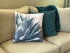 The Clarity throw pillow on a living room couch.