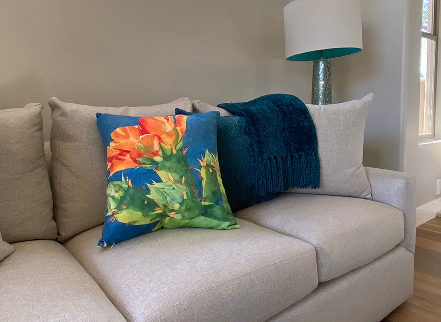 Wideshot of Ahead of Its Time decorative pillow on a couch