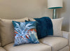 Wideshot of All in the Family decorative pillow on a couch