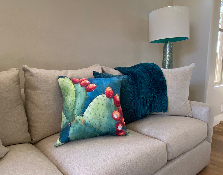 Wideshot of Fruit of the Opuntia decorative pillow on a couch