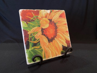 Sunflower 1 trivet on an iron stand