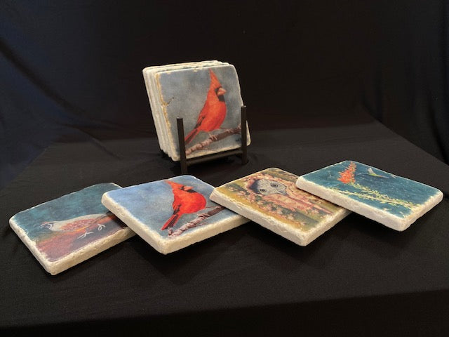 The full Feathered Friends collection of coasters